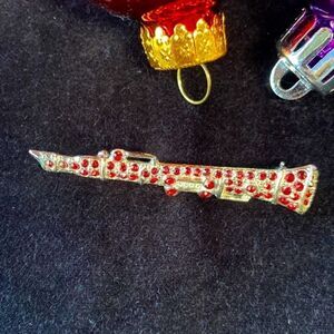 Vintage Clarinet Brooch with Ruby Red Gemstones